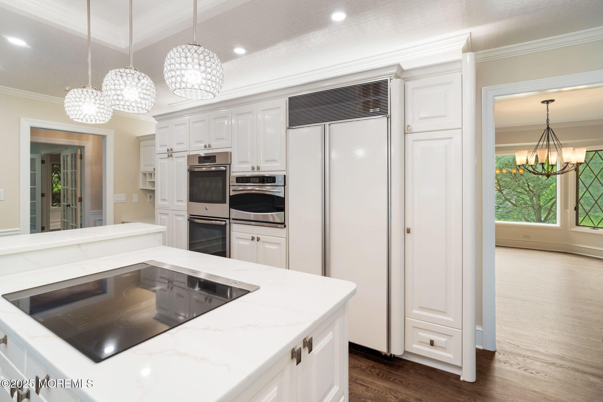 245 Borden Road Middletown, NJ 07748 - Photo 29 of 72 a kitchen that has a lot of white cabinets and stainless steel appliances