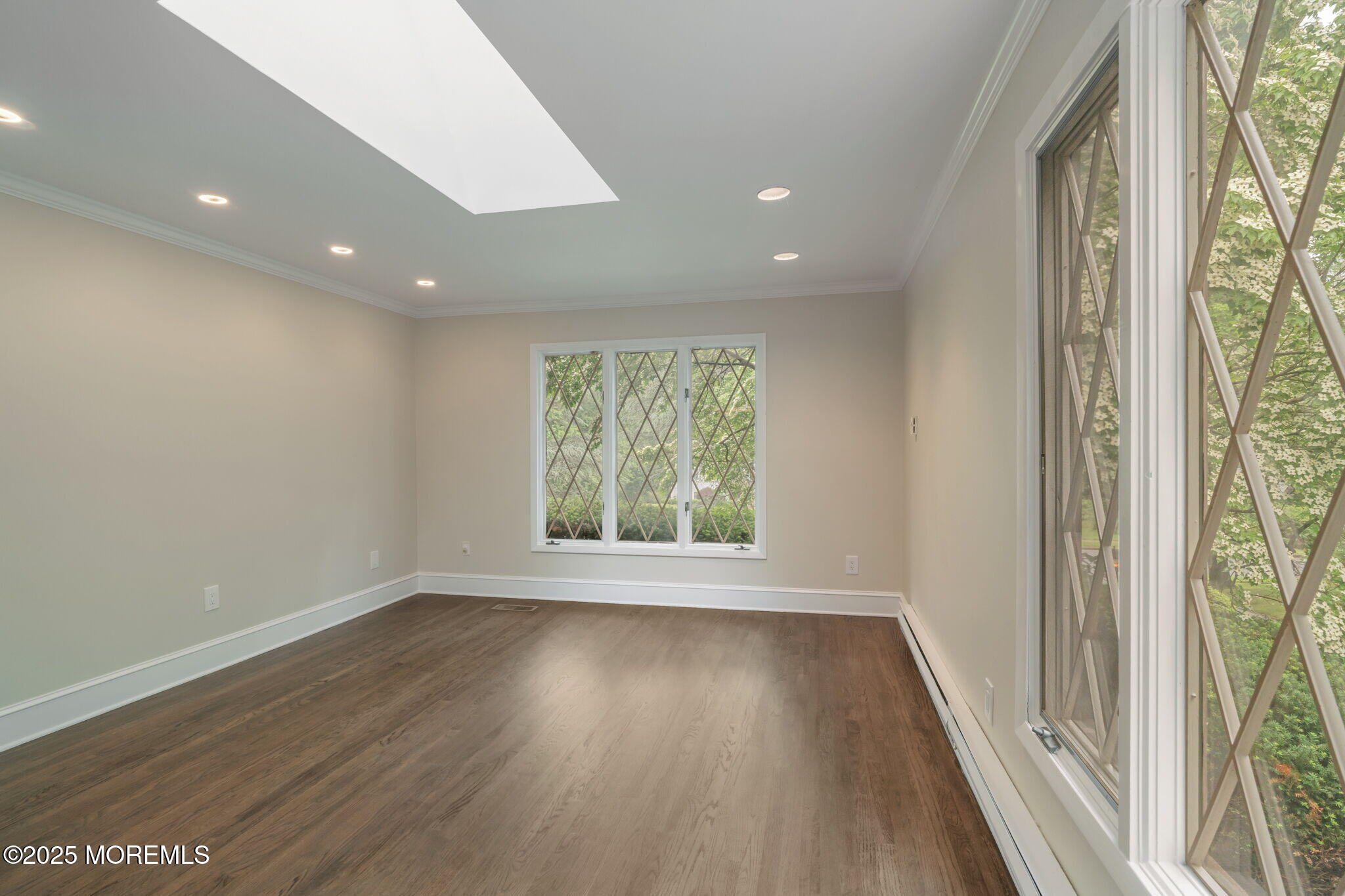 245 Borden Road Middletown, NJ 07748 - Photo 33 of 72 a view of room with window and wooden floor