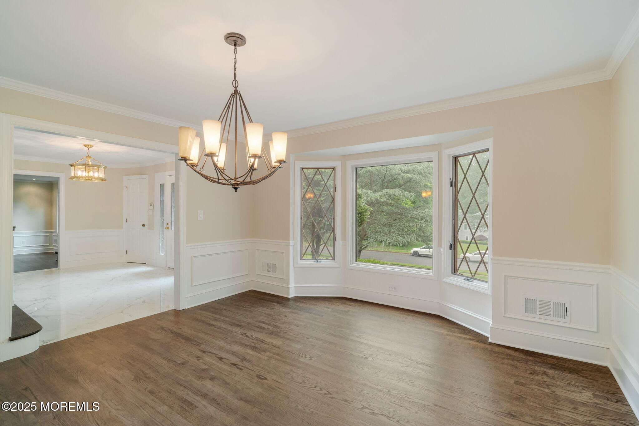 245 Borden Road Middletown, NJ 07748 - Photo 36 of 72 a view of empty room with wooden floor and fan