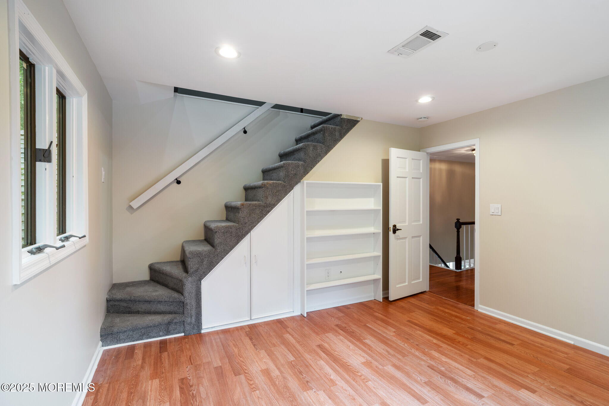 245 Borden Road Middletown, NJ 07748 - Photo 40 of 72 a view of entryway and hall with wooden floor