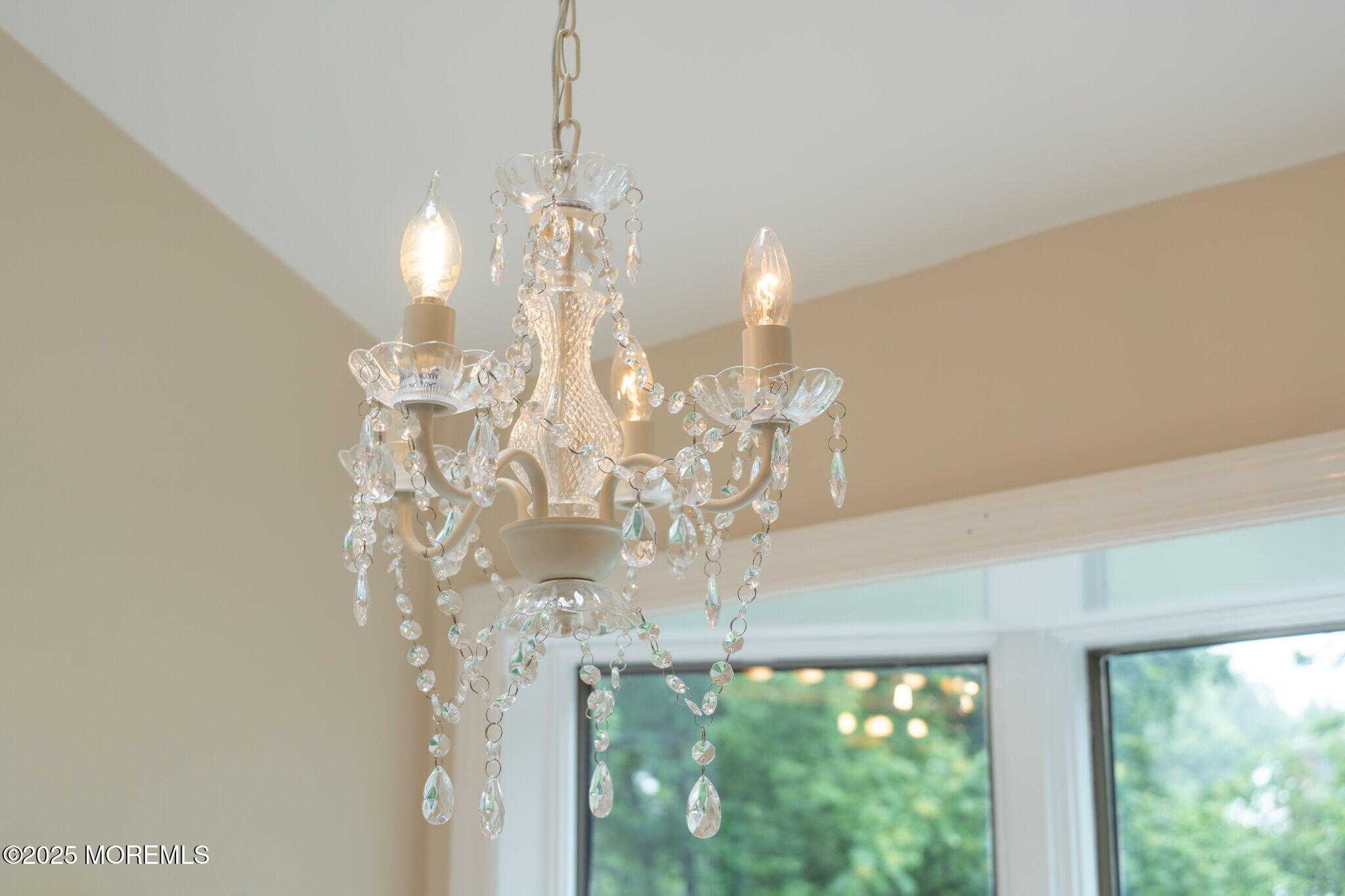245 Borden Road Middletown, NJ 07748 - Photo 51 of 72 a view of a dining room with furniture window and chandelier