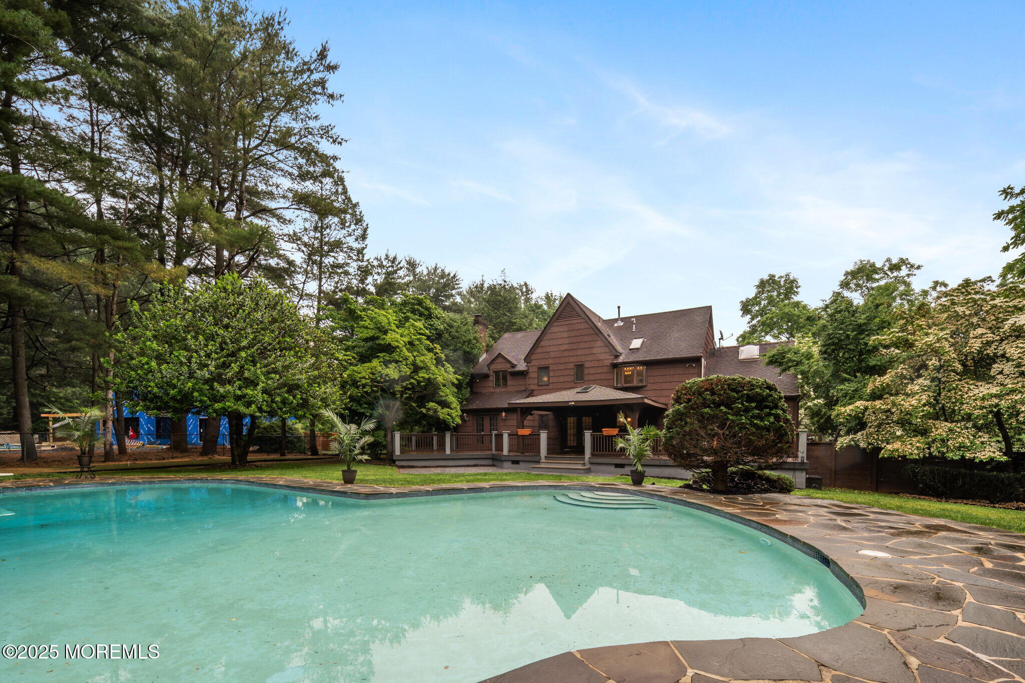 245 Borden Road Middletown, NJ 07748 - Photo 62 of 72 a view of a house with swimming pool and a yard