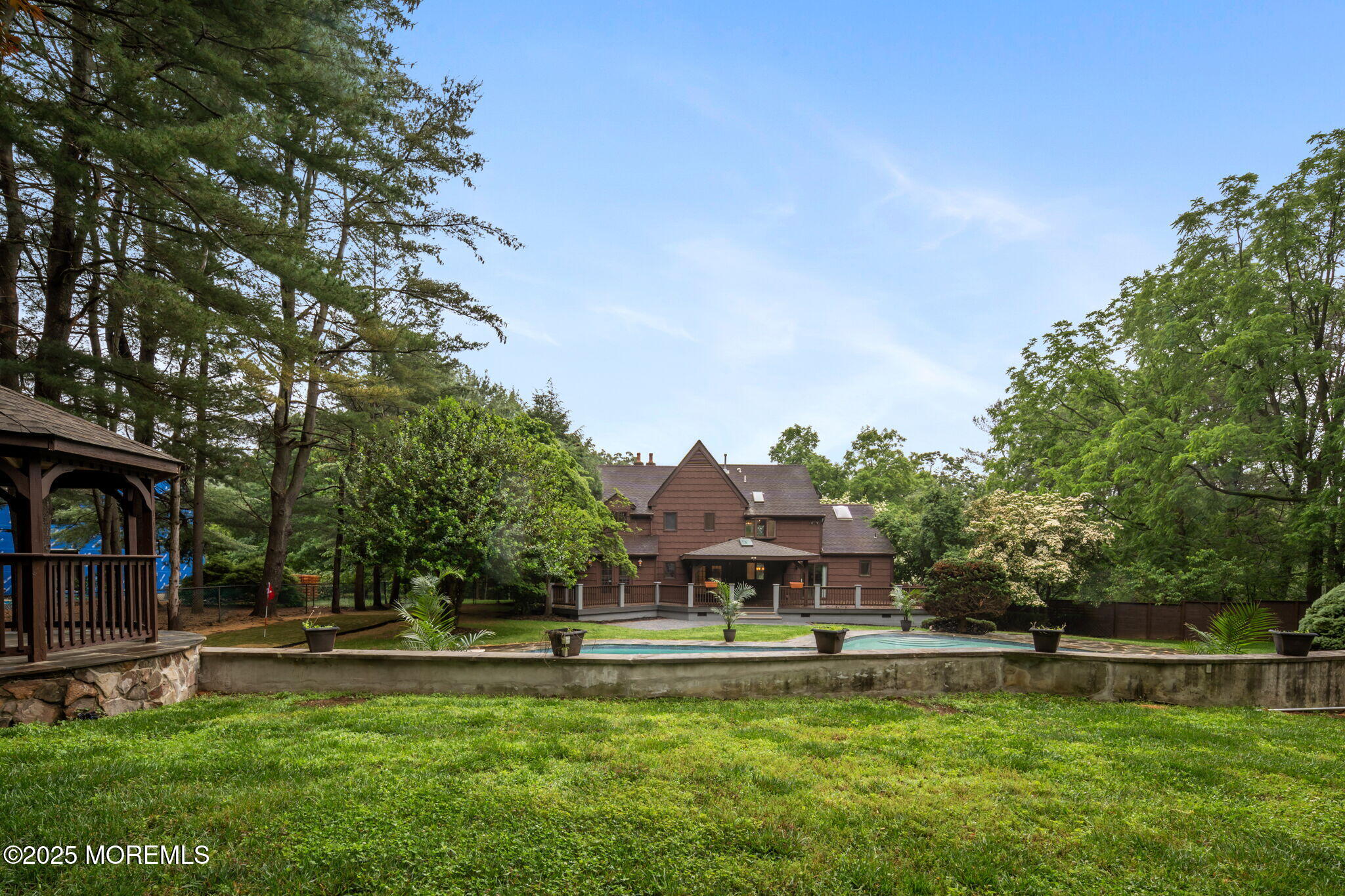 245 Borden Road Middletown, NJ 07748 - Photo 65 of 72 a swimming pool with outdoor seating and yard