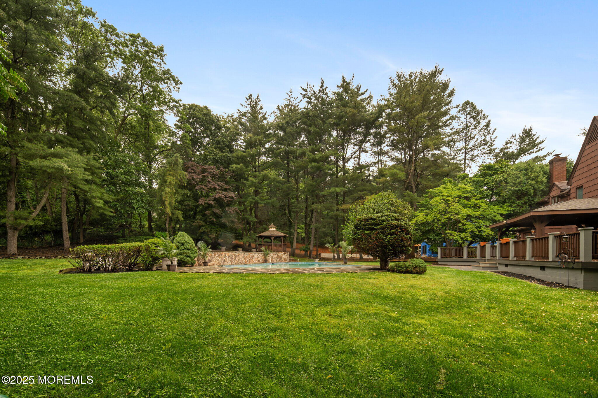 245 Borden Road Middletown, NJ 07748 - Photo 66 of 72 a view of a house with backyard and trees