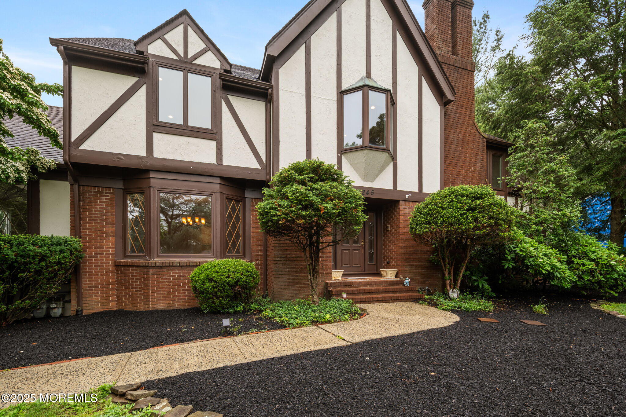245 Borden Road Middletown, NJ 07748 - Photo 7 of 72 a front view of a house with garden