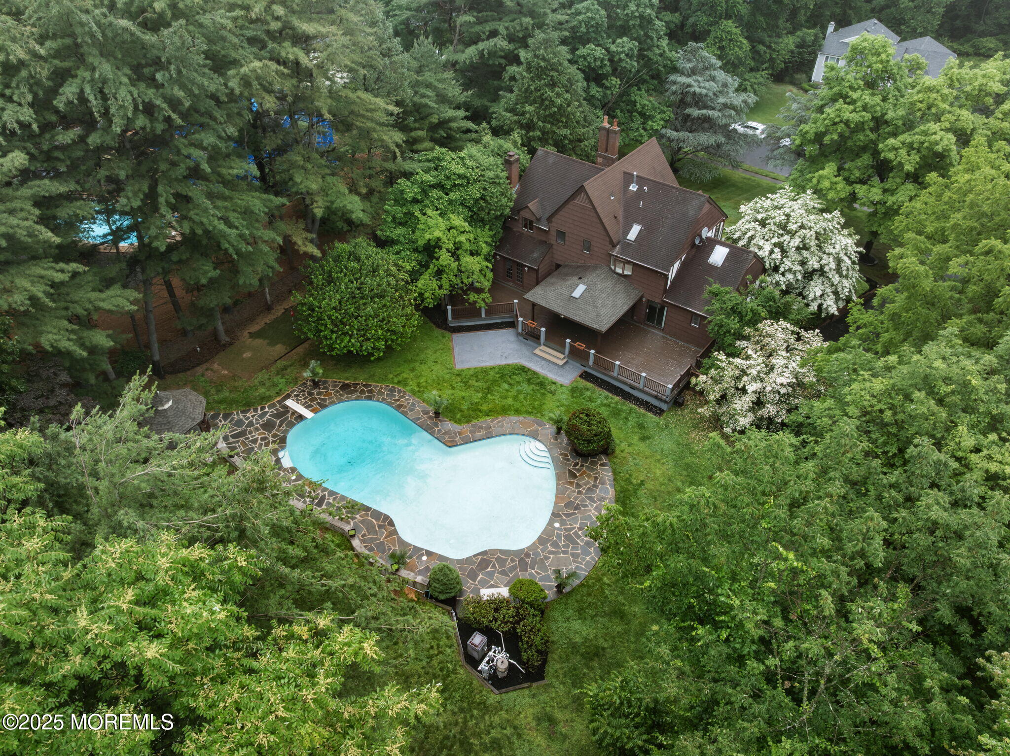 245 Borden Road Middletown, NJ 07748 - Photo 72 of 72 an aerial view of a house with a yard and outdoor seating