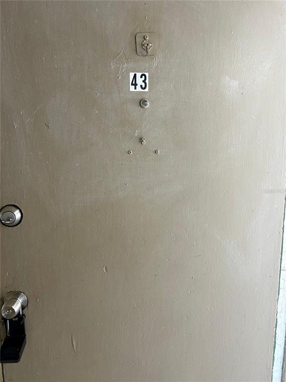 1229 Kennedy Road, Unit 43 Daytona Beach, FL 32117 - Photo 2 of 9 a view of staircase