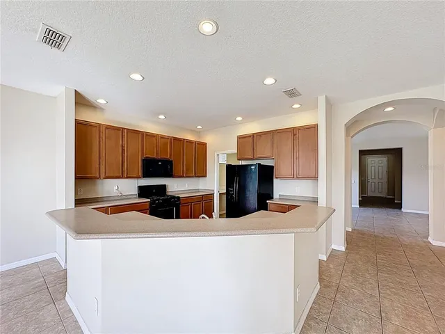 a view of livingroom with furniture and window