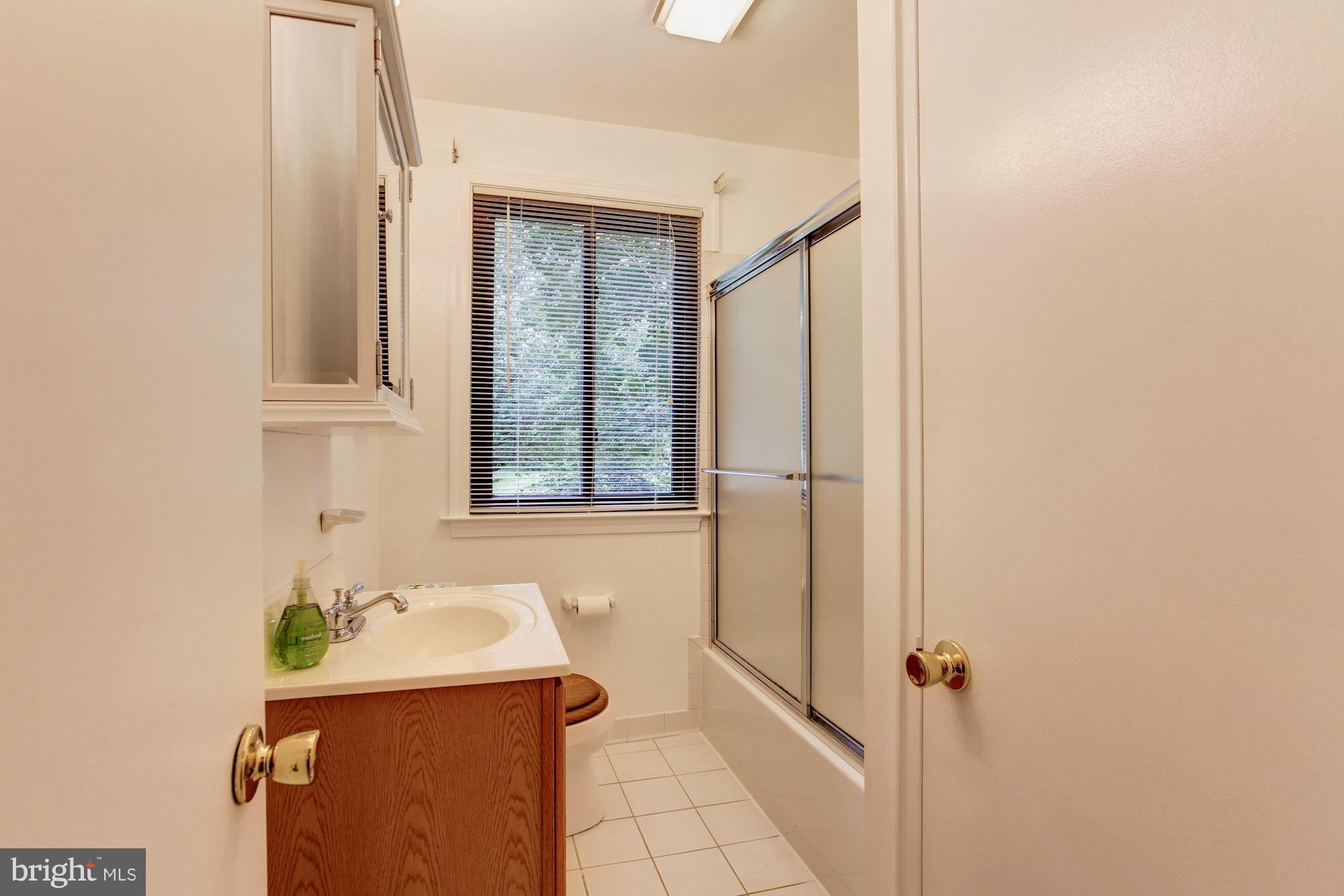 5927 Conway Road Bethesda, MD 20817 - Photo 14 of 28 Main level bathroom
