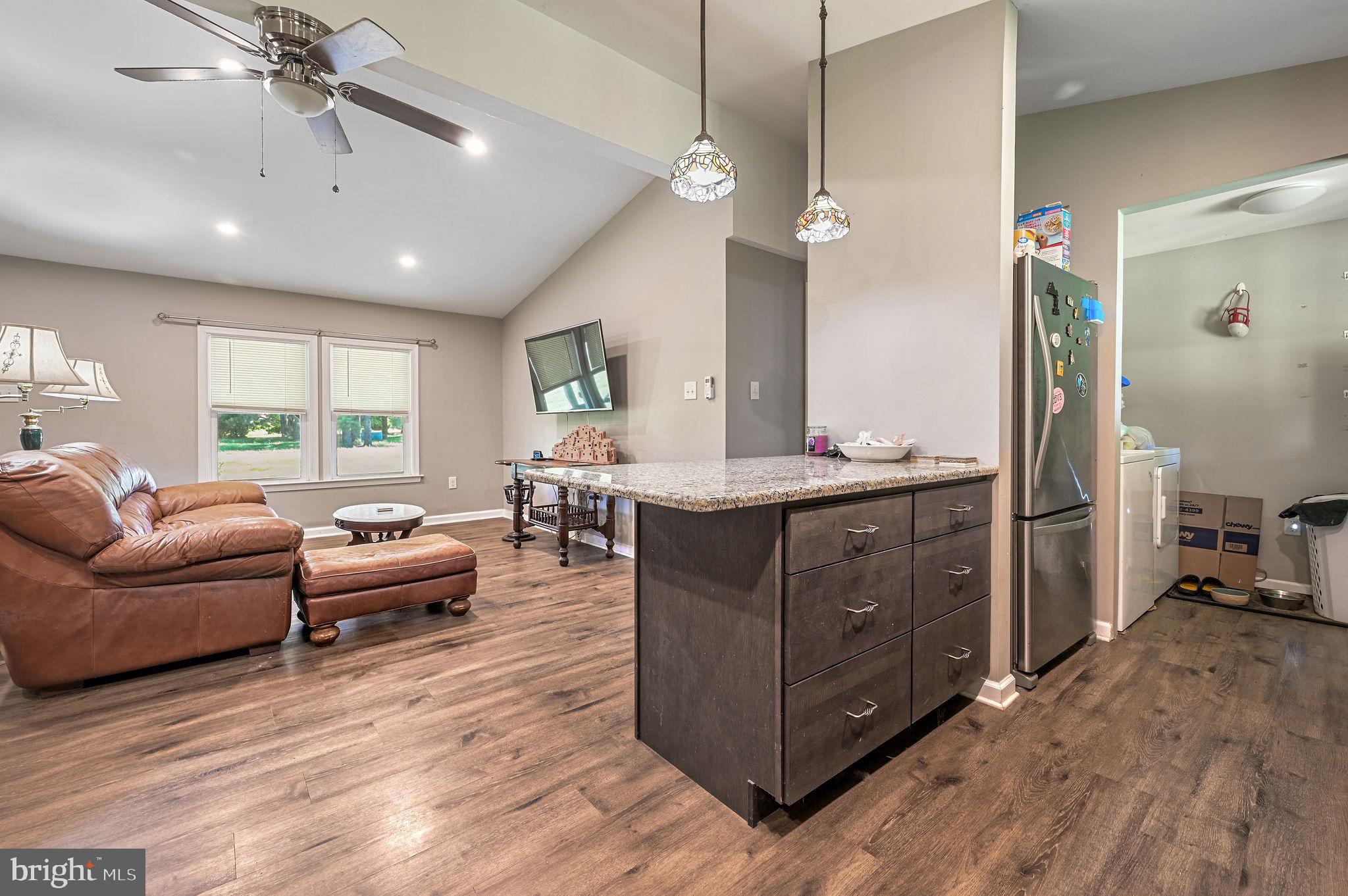 2821 Sandtown Road Felton, DE 19943 - Photo 17 of 26 a living room with furniture and a large window