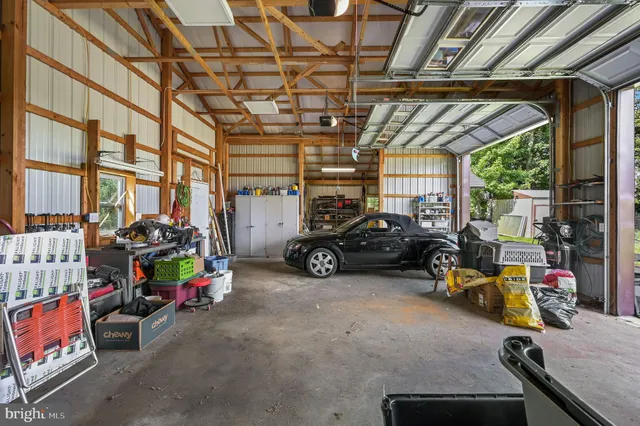 a view of parking garage with cars