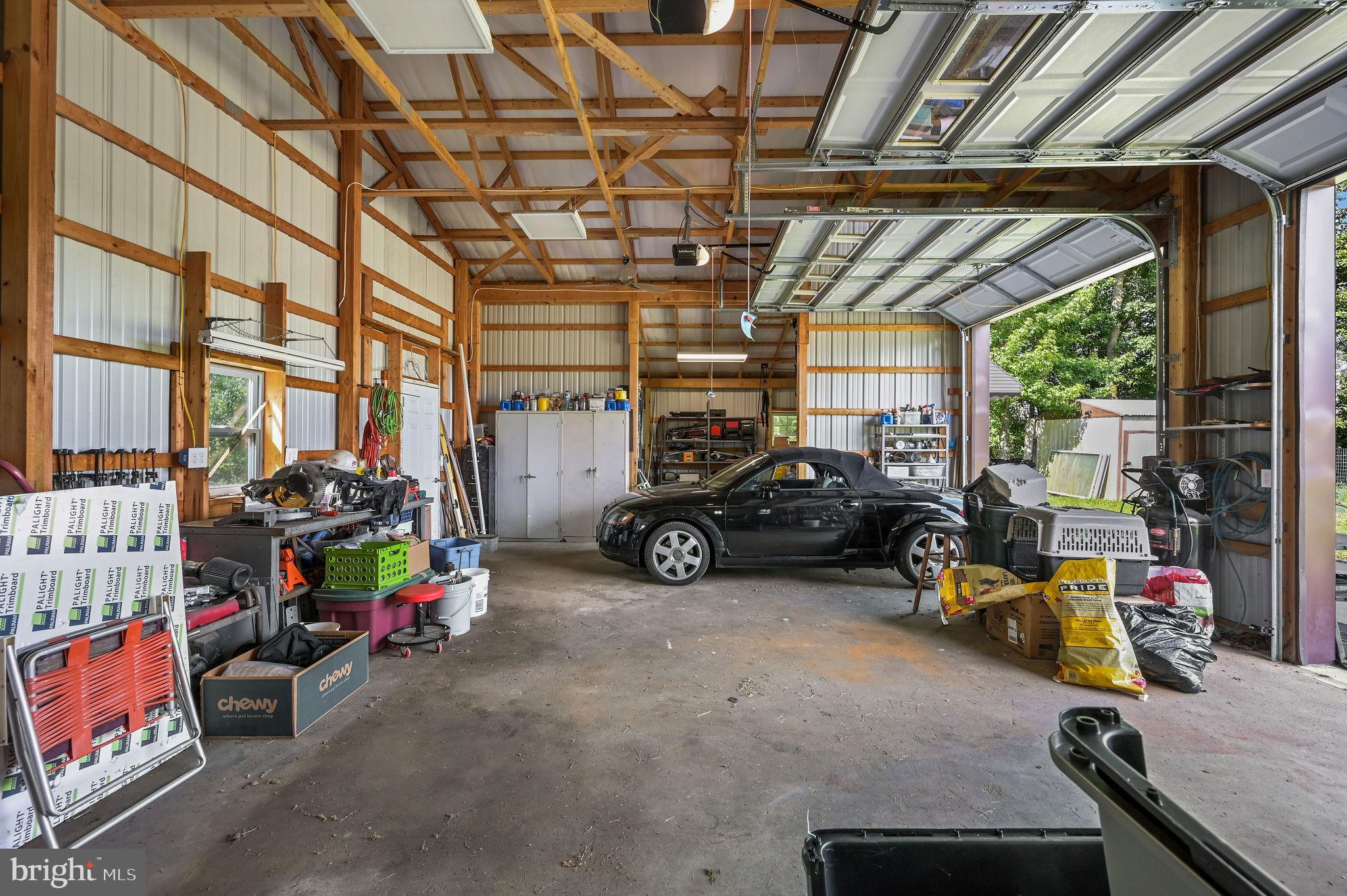 2821 Sandtown Road Felton, DE 19943 - Photo 6 of 26 a view of parking garage with cars