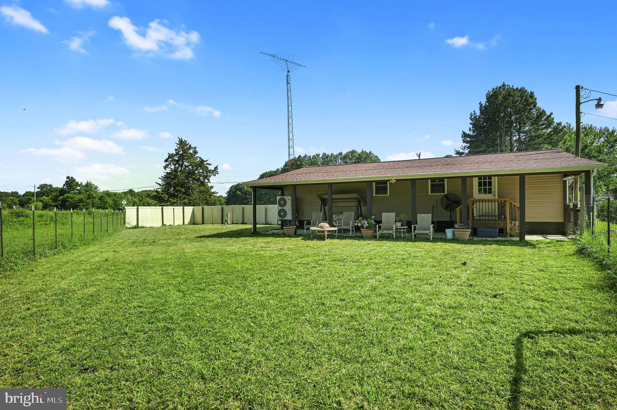 2821 Sandtown Road Felton, DE 19943 - Photo 8 of 26 a front view of house with yard and green space