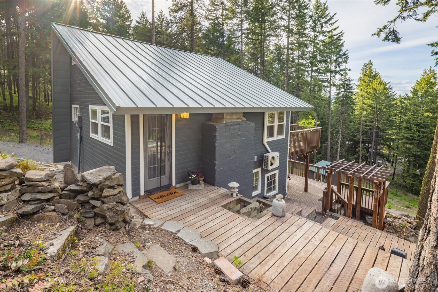 451 Aspen Springs Road Cle Elum, WA 98922 - Photo 22 of 27 a view of house with patio outdoor seating