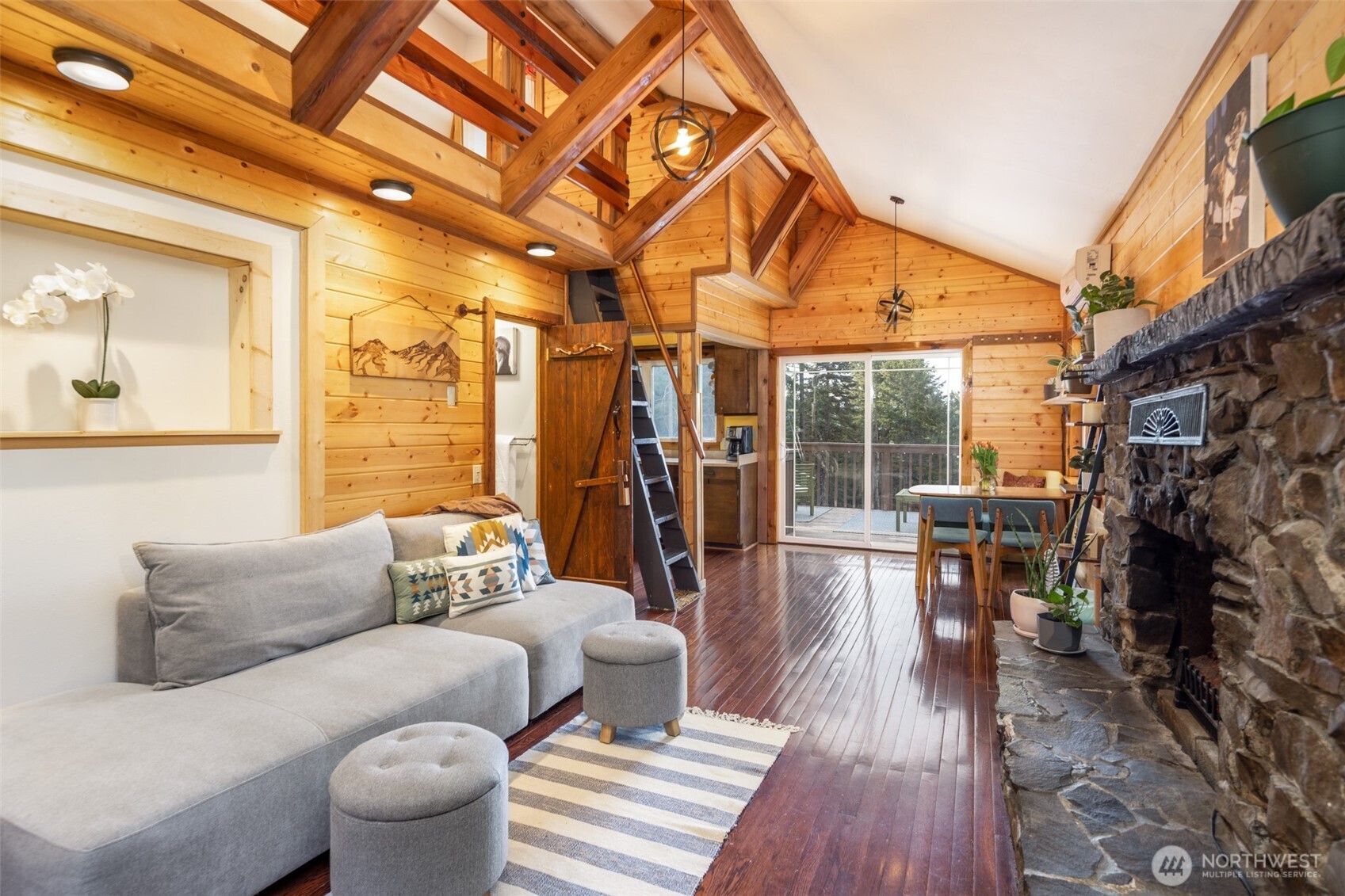 451 Aspen Springs Road Cle Elum, WA 98922 - Photo 3 of 27 a living room with furniture and a fireplace