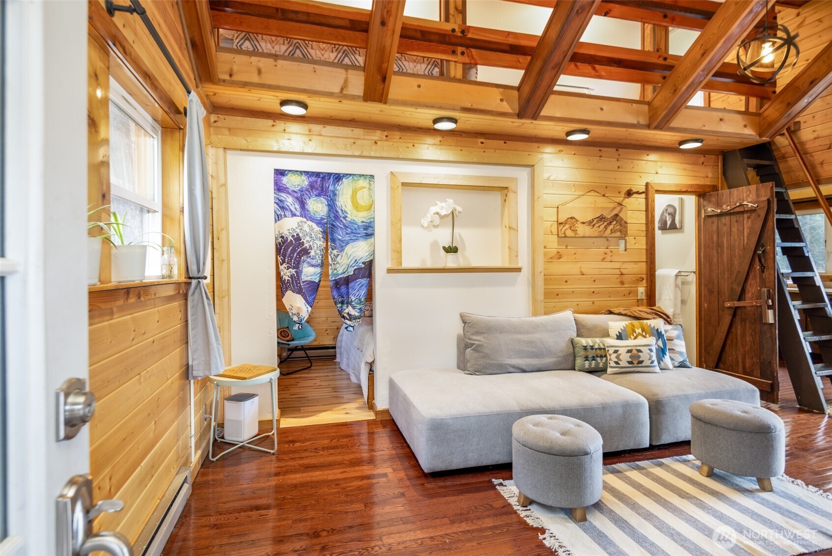 451 Aspen Springs Road Cle Elum, WA 98922 - Photo 4 of 27 a bedroom with furniture and wooden floor