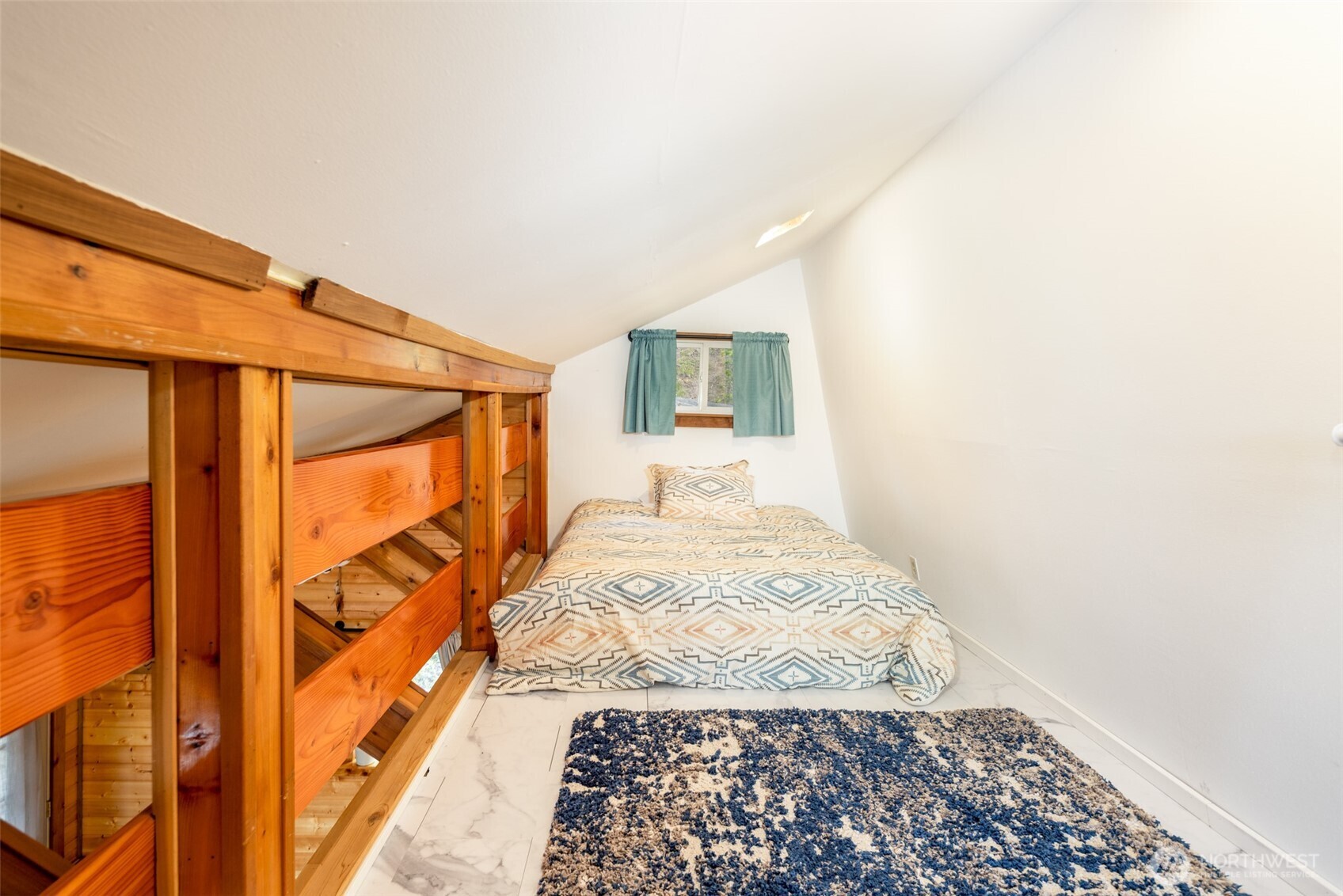 451 Aspen Springs Road Cle Elum, WA 98922 - Photo 8 of 27 a bedroom with a bed and a window