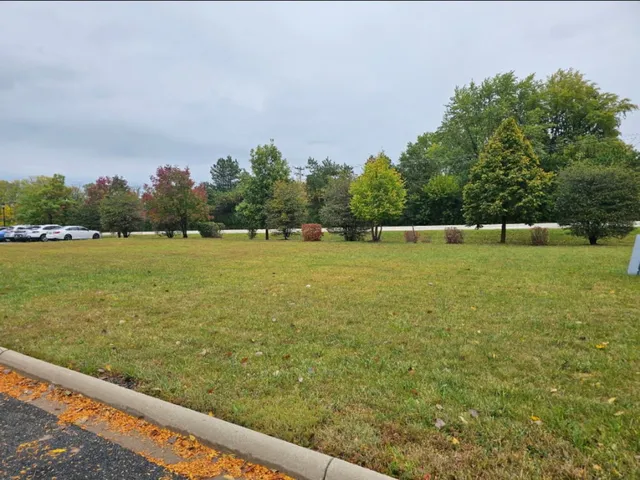 a view of a large body of water with a large mountain view