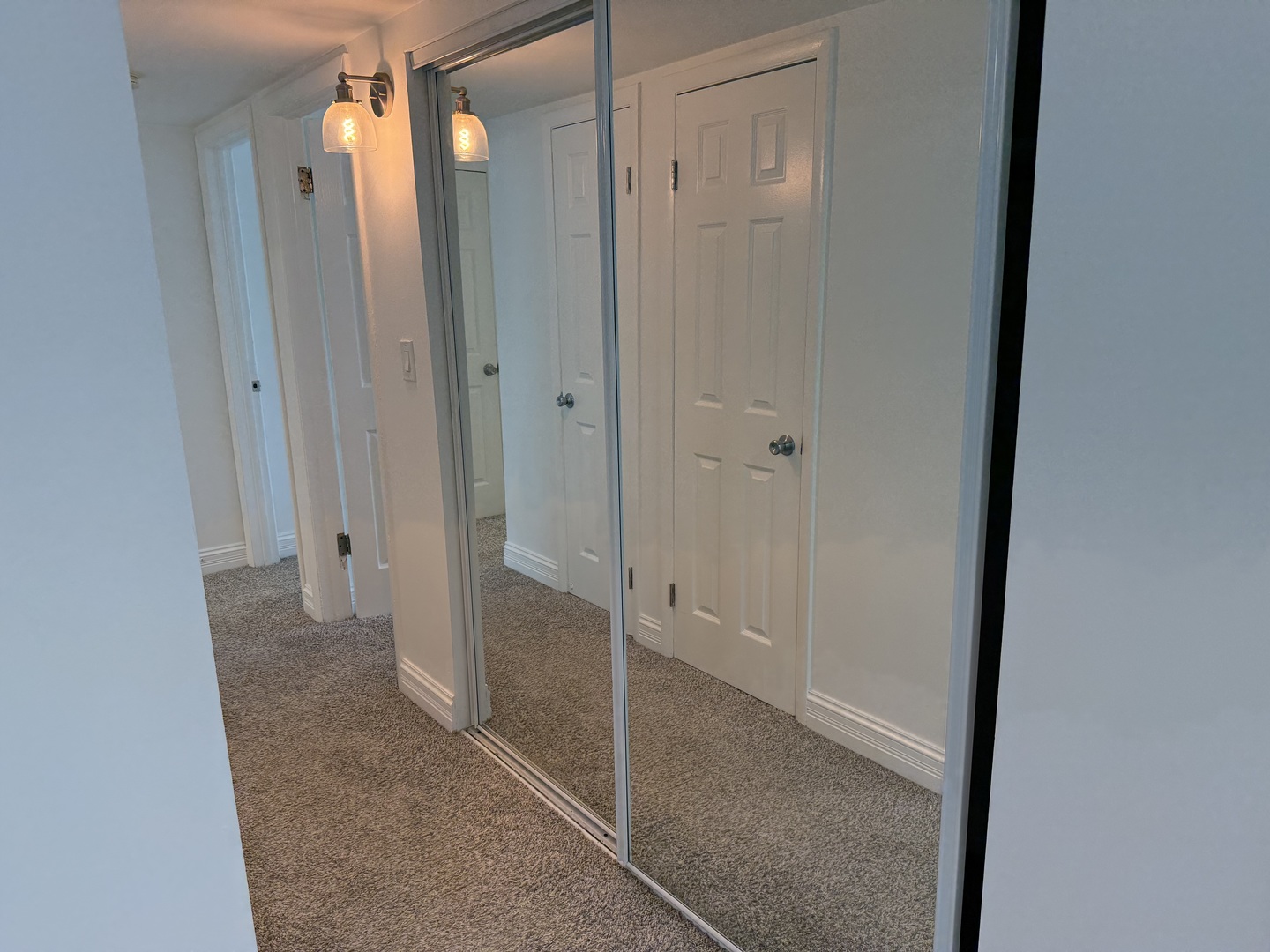 16W525 Mockingbird Lane, Unit 102 Willowbrook, IL 60527 - Photo 16 of 25 a bathroom with a shower and a glass door