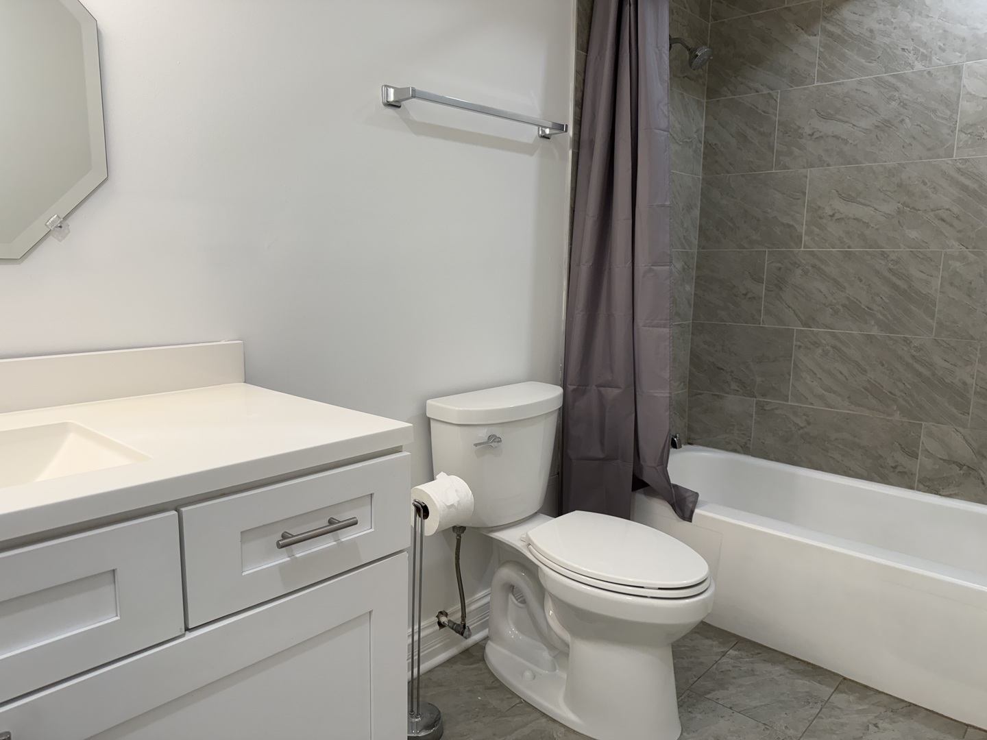 16W525 Mockingbird Lane, Unit 102 Willowbrook, IL 60527 - Photo 18 of 25 a bathroom with a toilet and a shower