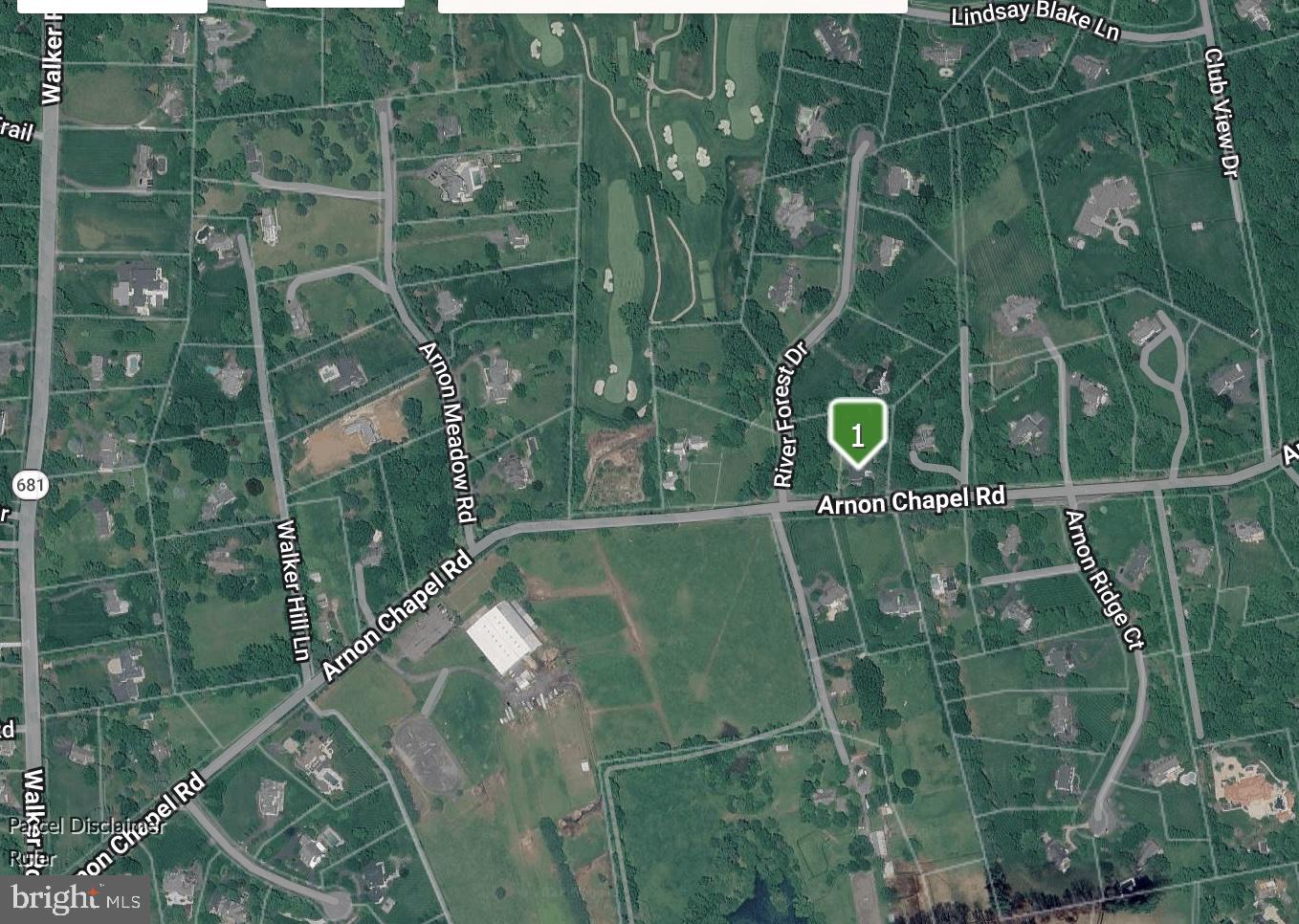 9806 Arnon Chapel Road Great Falls, VA 22066 - Photo 2 of 2 Residential streets in lush greenery.