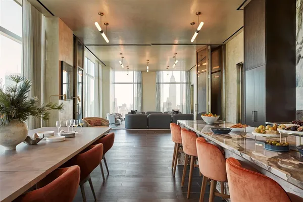 a view of a house with couches in front of house