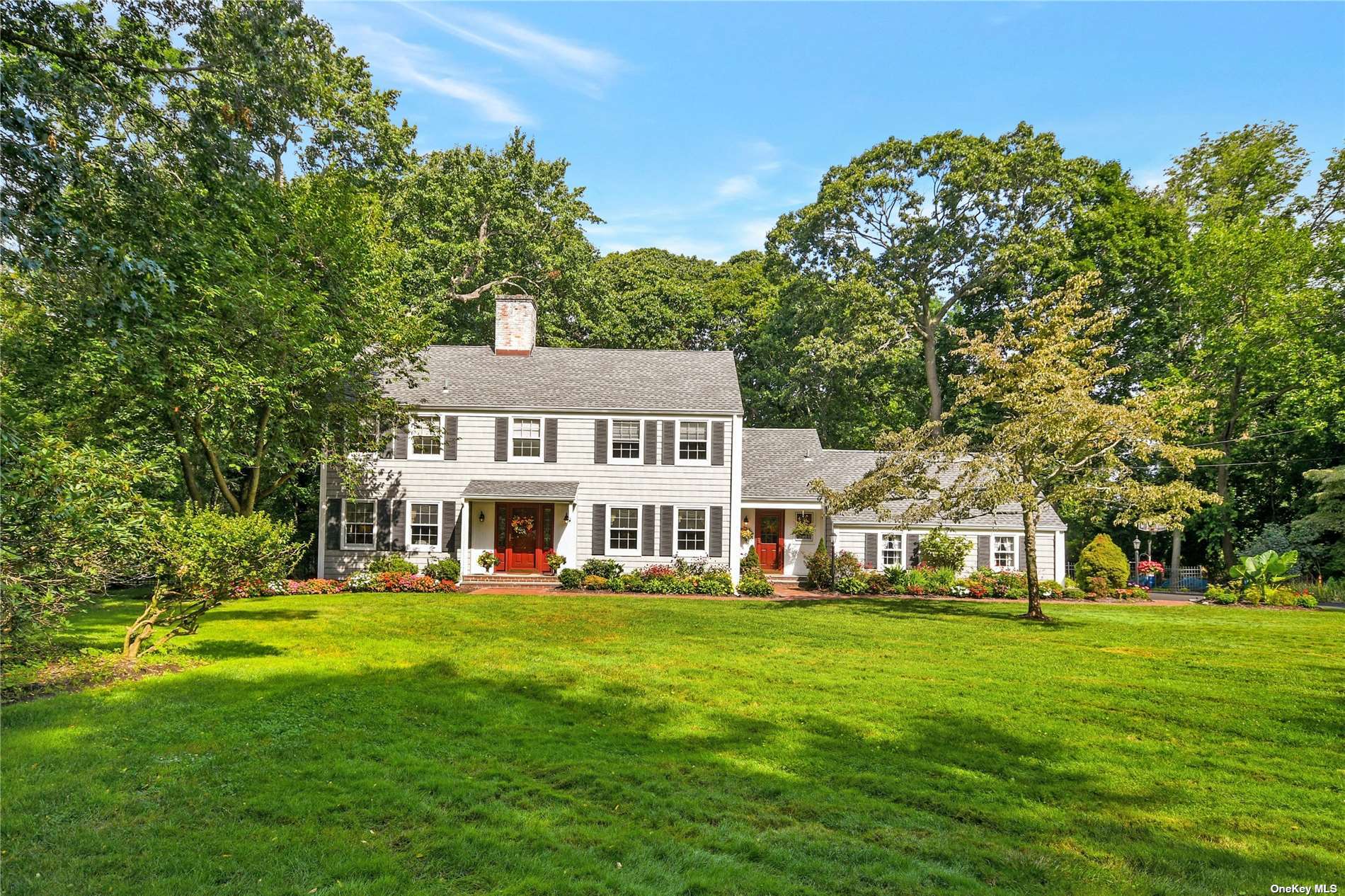 9 Tracklot Road Nissequogue, NY 11780 - Photo 1 of 1 a view of a house with a big yard and sitting area