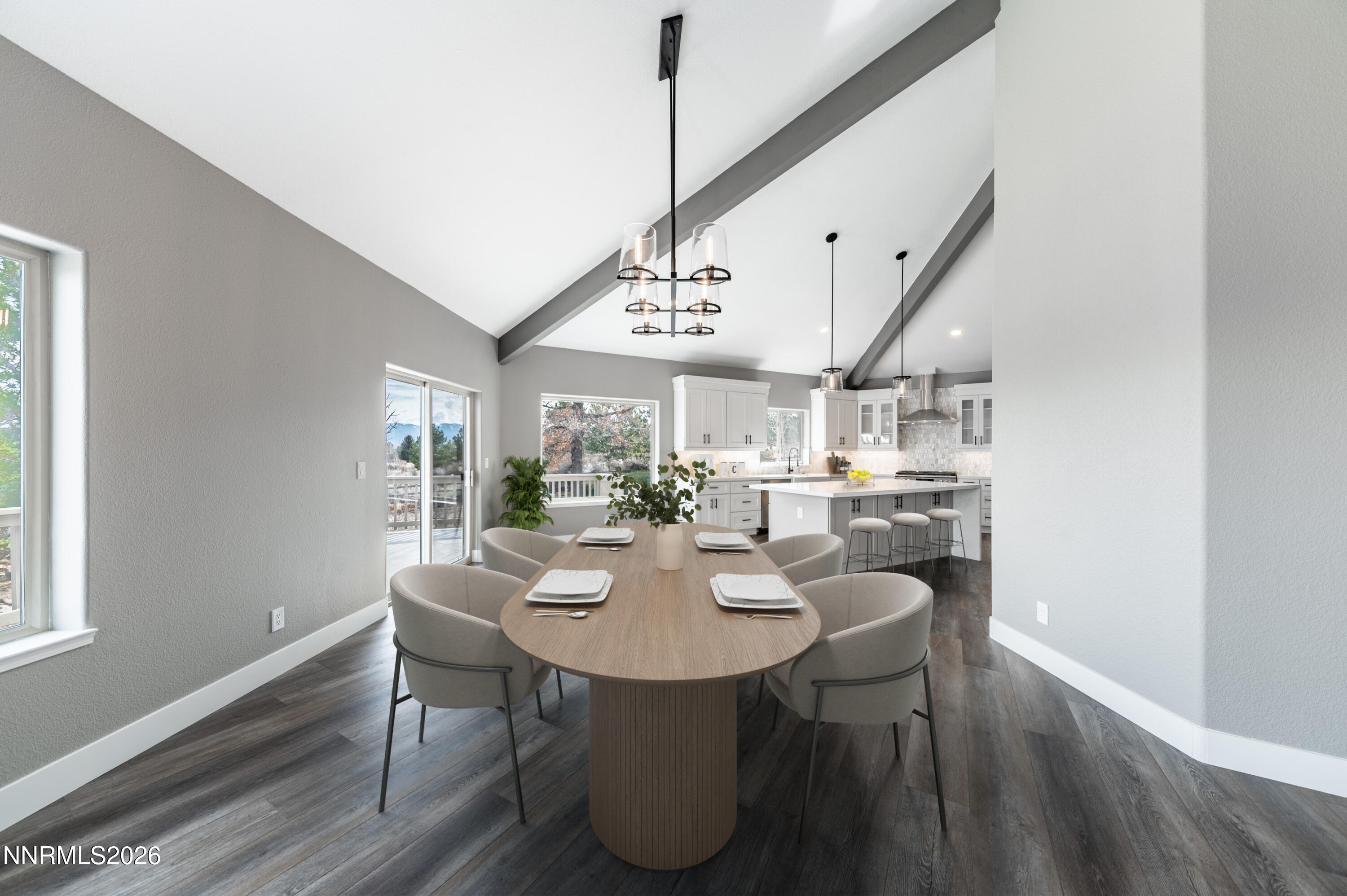 14330 East Windriver Lane Reno, NV 89511 - Photo 10 of 36 a view of a dining room with furniture window and wooden floor