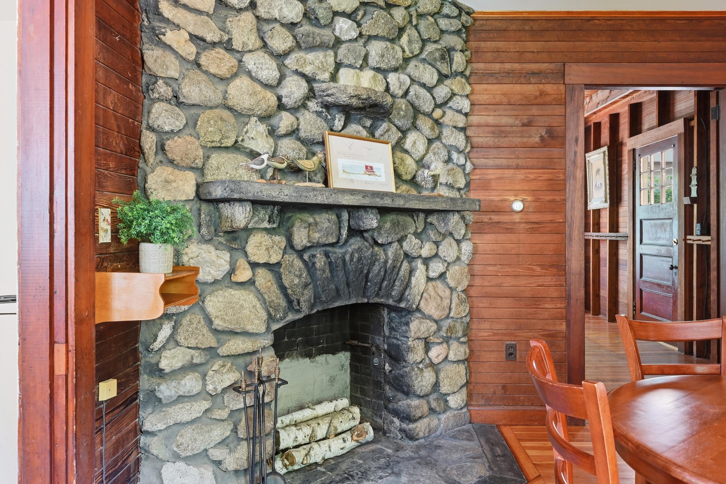 149 Cathedral Road Brewster, MA 02631 - Photo 10 of 53 Dining room fireplace