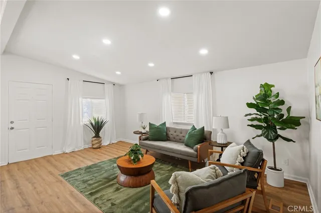 a kitchen with a table and chairs in it