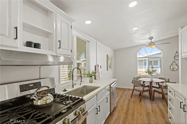a bedroom with a bed couch and window