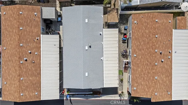 an aerial view of a city with lots of residential buildings