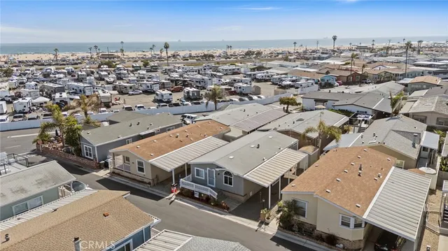 an aerial view of beach and ocean