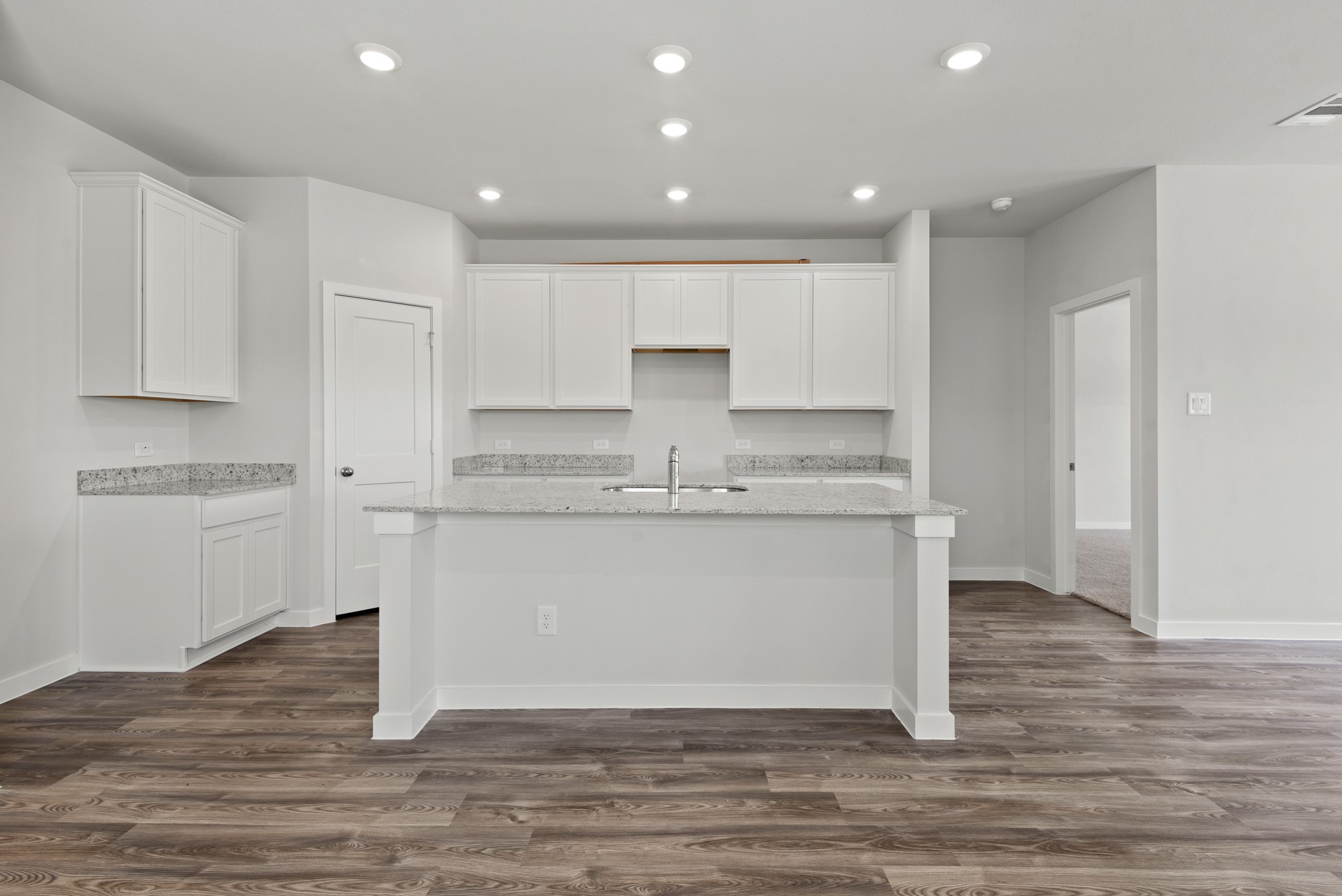 322 Amy Street Angleton, TX 77515 - Photo 3 of 27 a view of kitchen with granite countertop stainless steel appliances