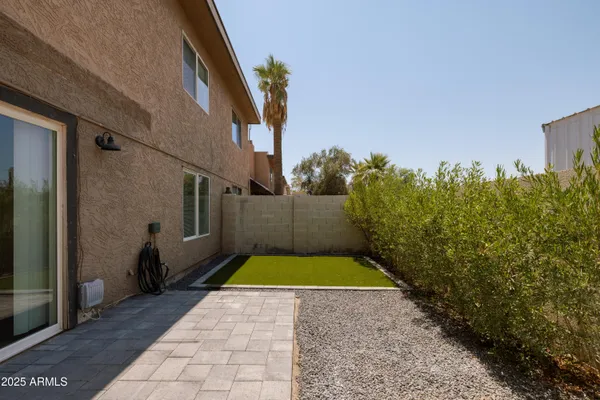 a view of yard with umbrella