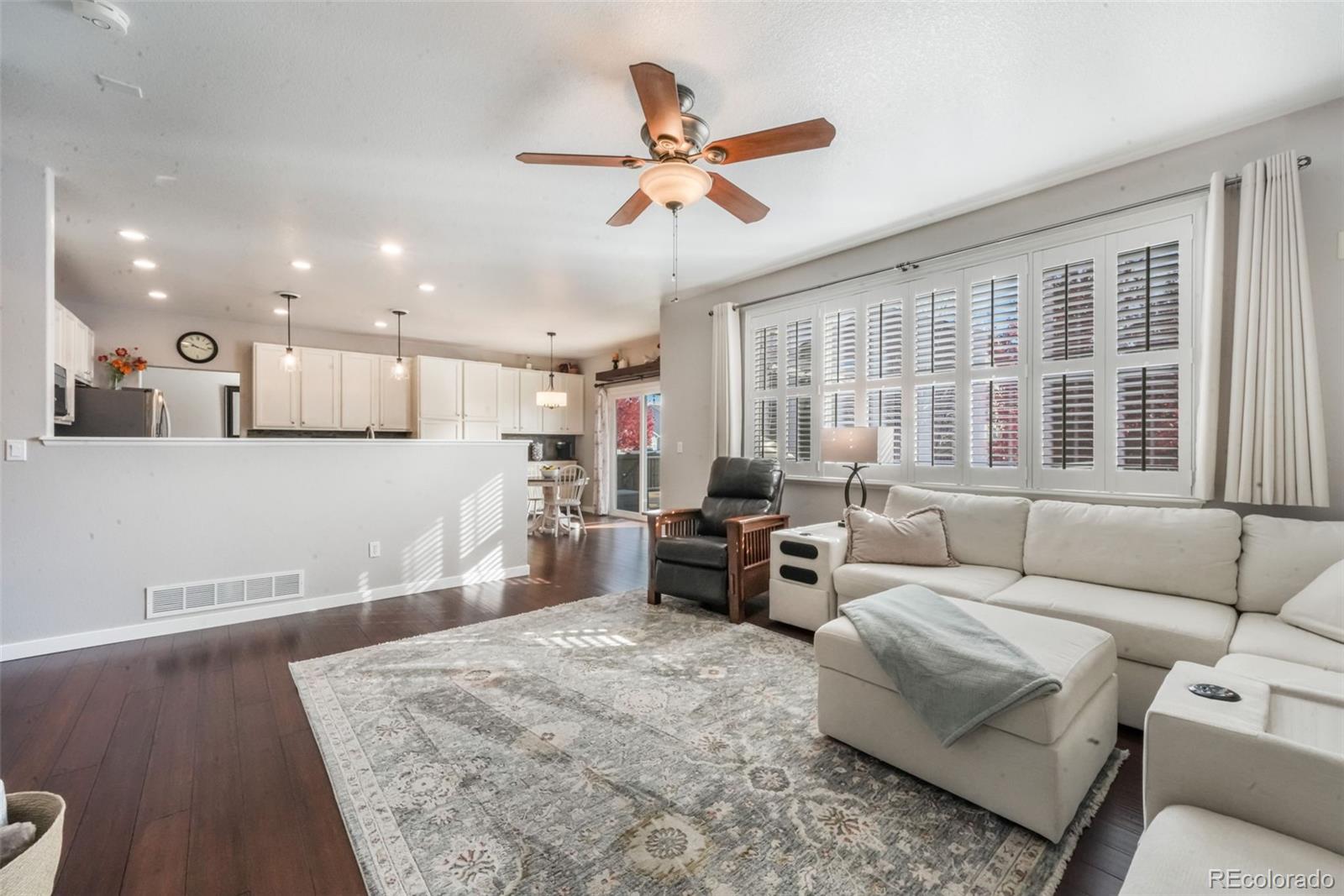 4457 Centerville Drive Colorado Springs, CO 80922 - Photo 21 of 50 a living room with furniture and a large window