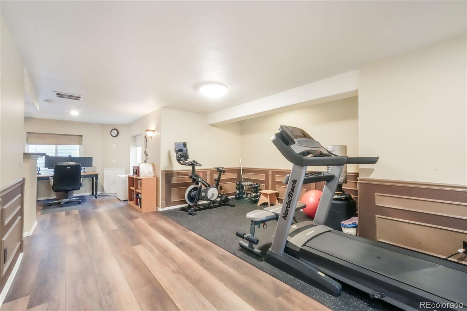 4457 Centerville Drive Colorado Springs, CO 80922 - Photo 44 of 50 a view of a room with gym equipment