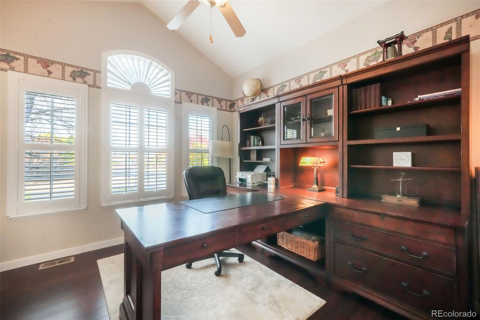 4457 Centerville Drive Colorado Springs, CO 80922 - Photo 8 of 50 a room with furniture window and wooden floor