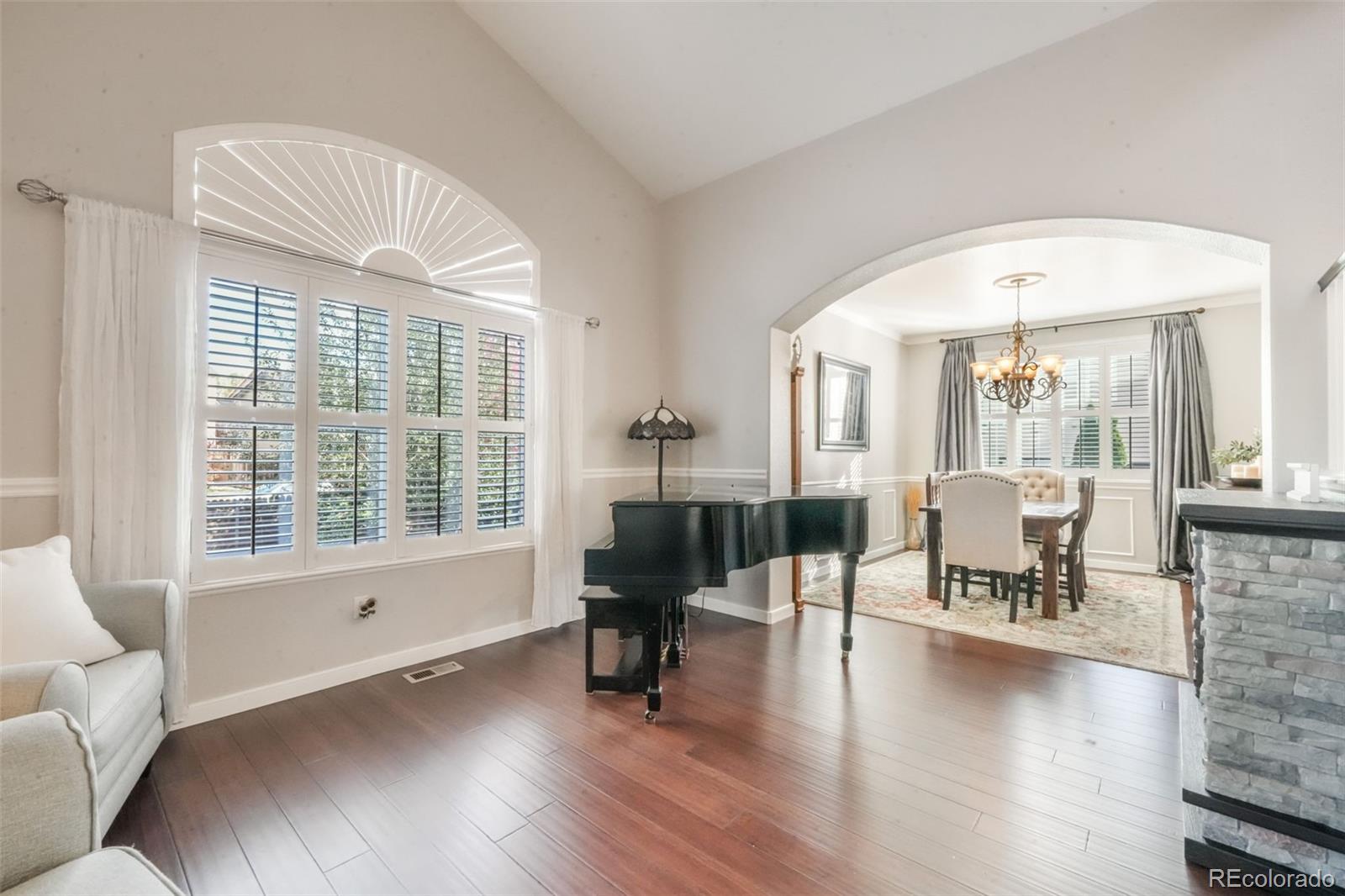 4457 Centerville Drive Colorado Springs, CO 80922 - Photo 9 of 50 a living room with furniture and a large window
