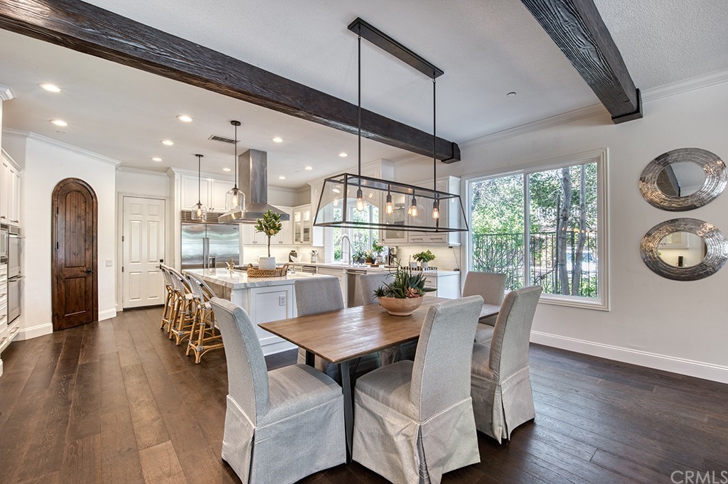 4 Black Walnut Coto de Caza, CA 92679 - Photo 13 of 39 a dining room with furniture a window and wooden floor