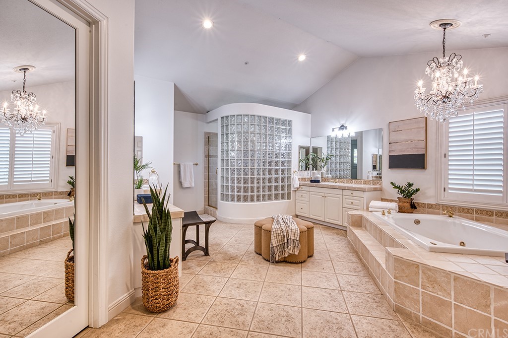 4 Black Walnut Coto de Caza, CA 92679 - Photo 25 of 39 a spacious bathroom with a sink and a mirror