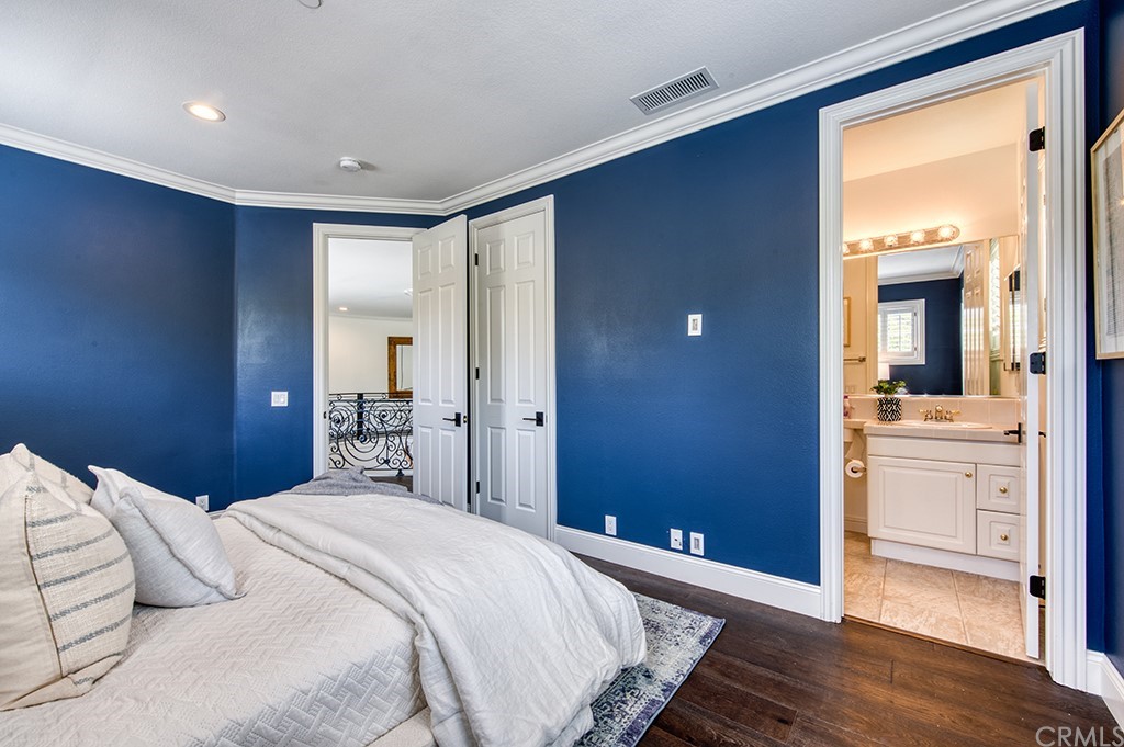 4 Black Walnut Coto de Caza, CA 92679 - Photo 33 of 39 a bedroom with a bed and a dresser