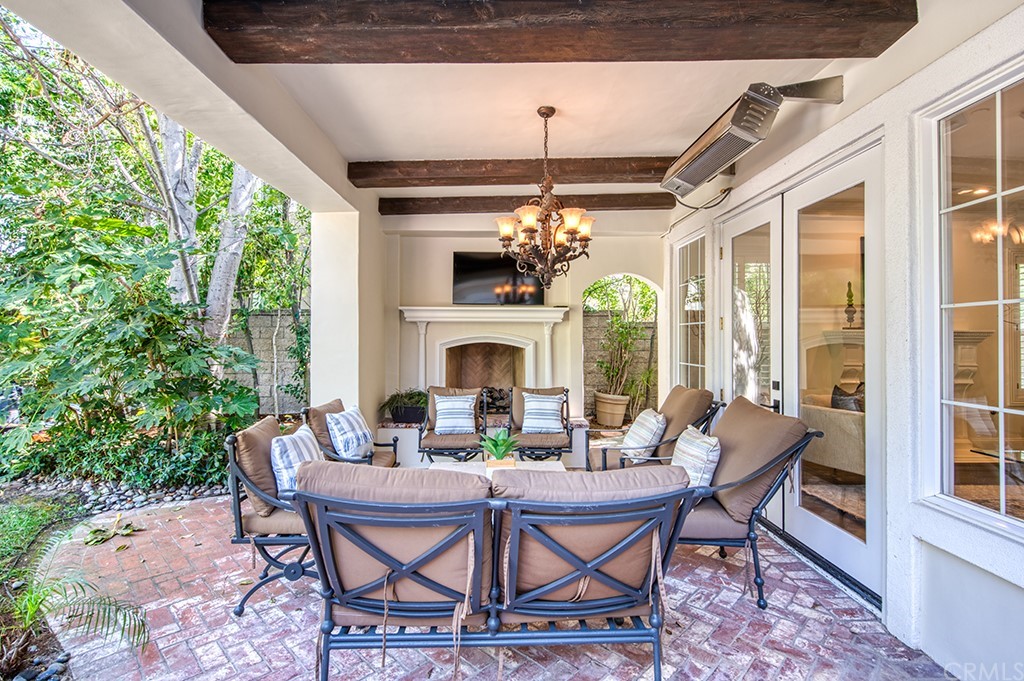 4 Black Walnut Coto de Caza, CA 92679 - Photo 36 of 39 a view of a dining room with furniture wooden floor and chandelier