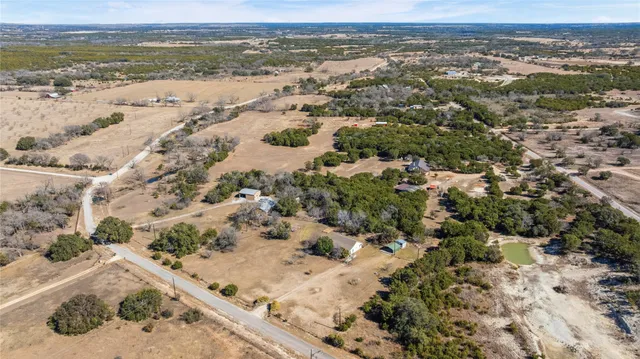 a view of a backyard of a house