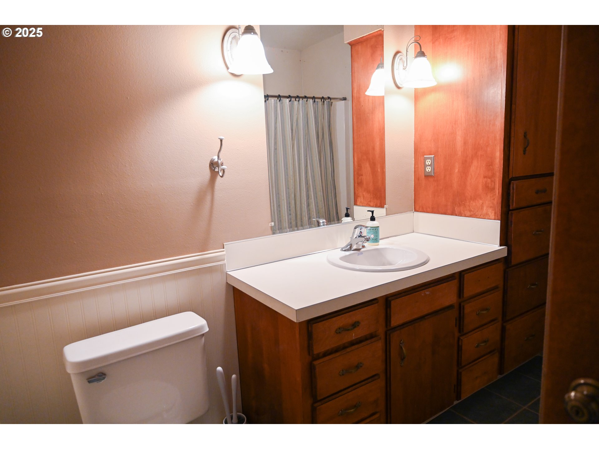 75938 Spring Hollow Road Adams, OR 97810 - Photo 12 of 26 a bathroom with a sink vanity and a mirror