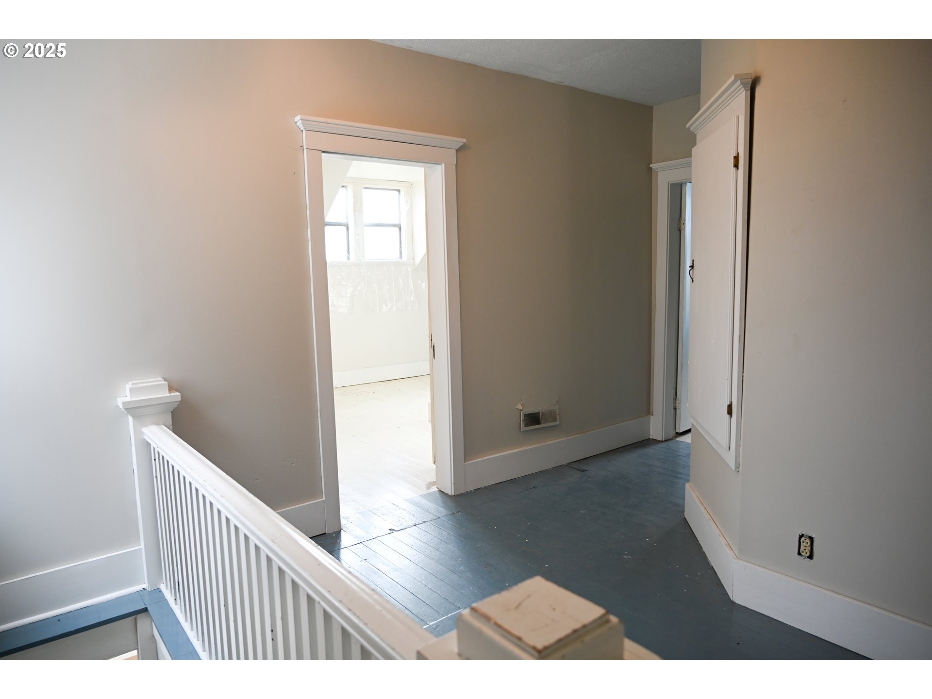 75938 Spring Hollow Road Adams, OR 97810 - Photo 20 of 26 a view of a hallway with wooden floor