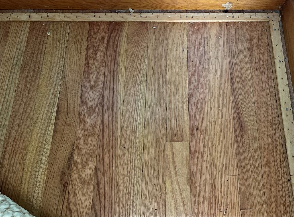 8 Cypress Road Coventry, RI 02816 - Photo 16 of 40 These solid oak wood floors look beautiful and have been relatively untouched for years - ready to be uncovered in the living room and all 3 bedrooms and their respective closets!