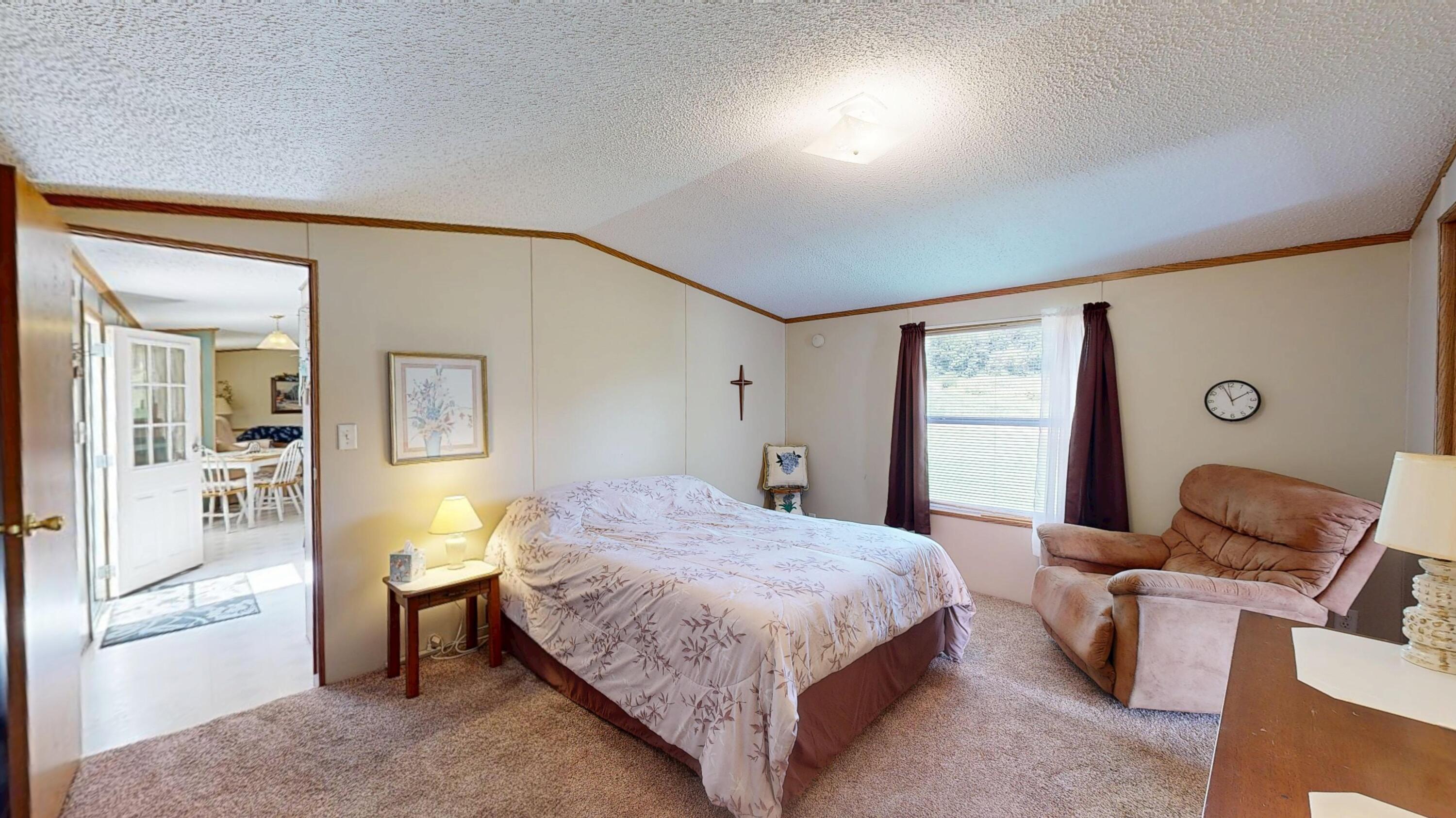 E2817 South Creek Road De Soto, WI 54624 - Photo 14 of 32 Master Bedroom