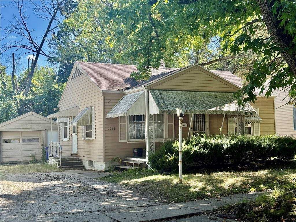 2039 East Whitmer Street Decatur, IL 62521 - Photo 1 of 1 a view of a house with yard and plants