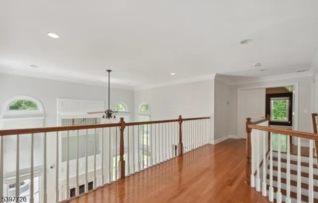 a bathroom with a sink double vanity and a toilet
